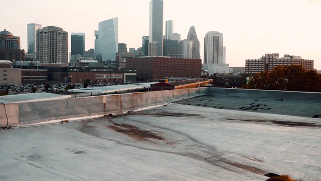 Walking on a rooftop in Texas