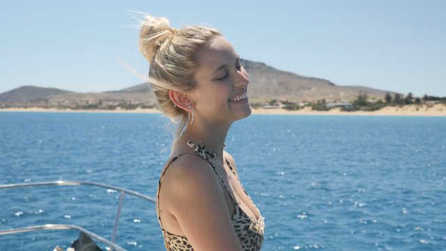 Happy woman on a boat