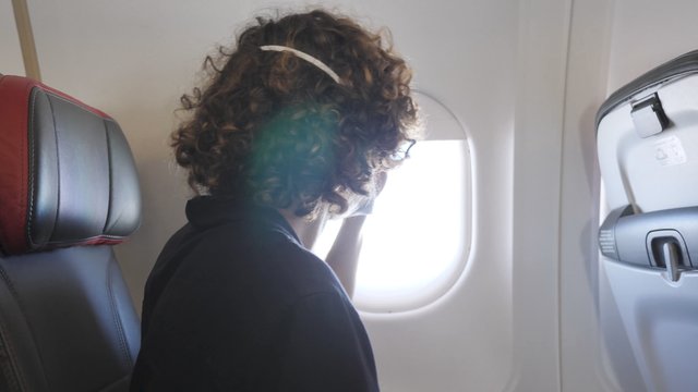 Closing airplane window