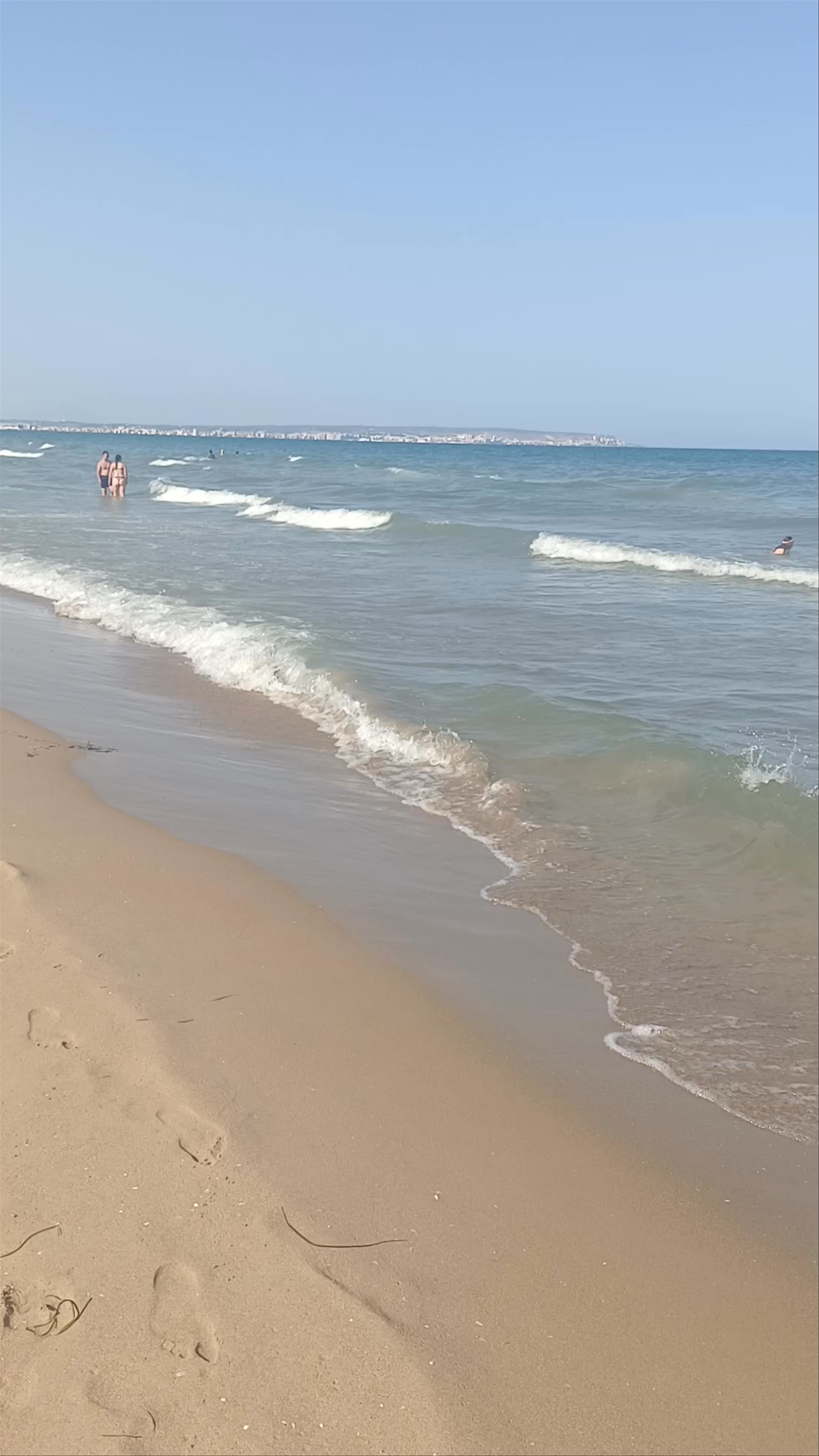 Sun-drenched Bliss at Playa de la Marina, La Marina, Spain