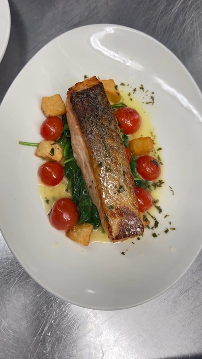 Manny's Bistro - Salmon and spinach and cherry tomatoes - French Near Me - New York, New York