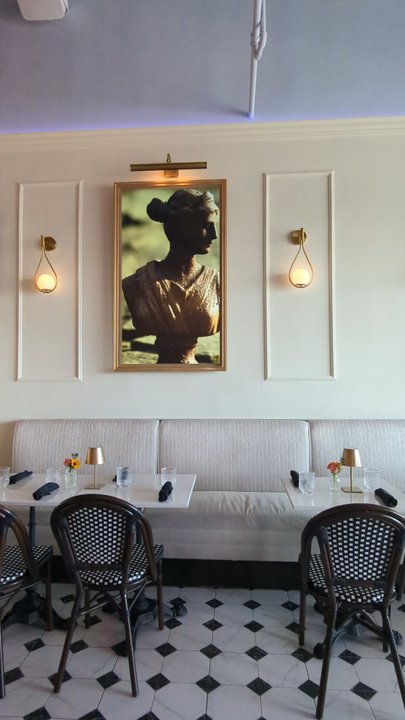 Ble Bistro - Moving pictures in the dining area. - French Near Me - Noblesville, Indiana