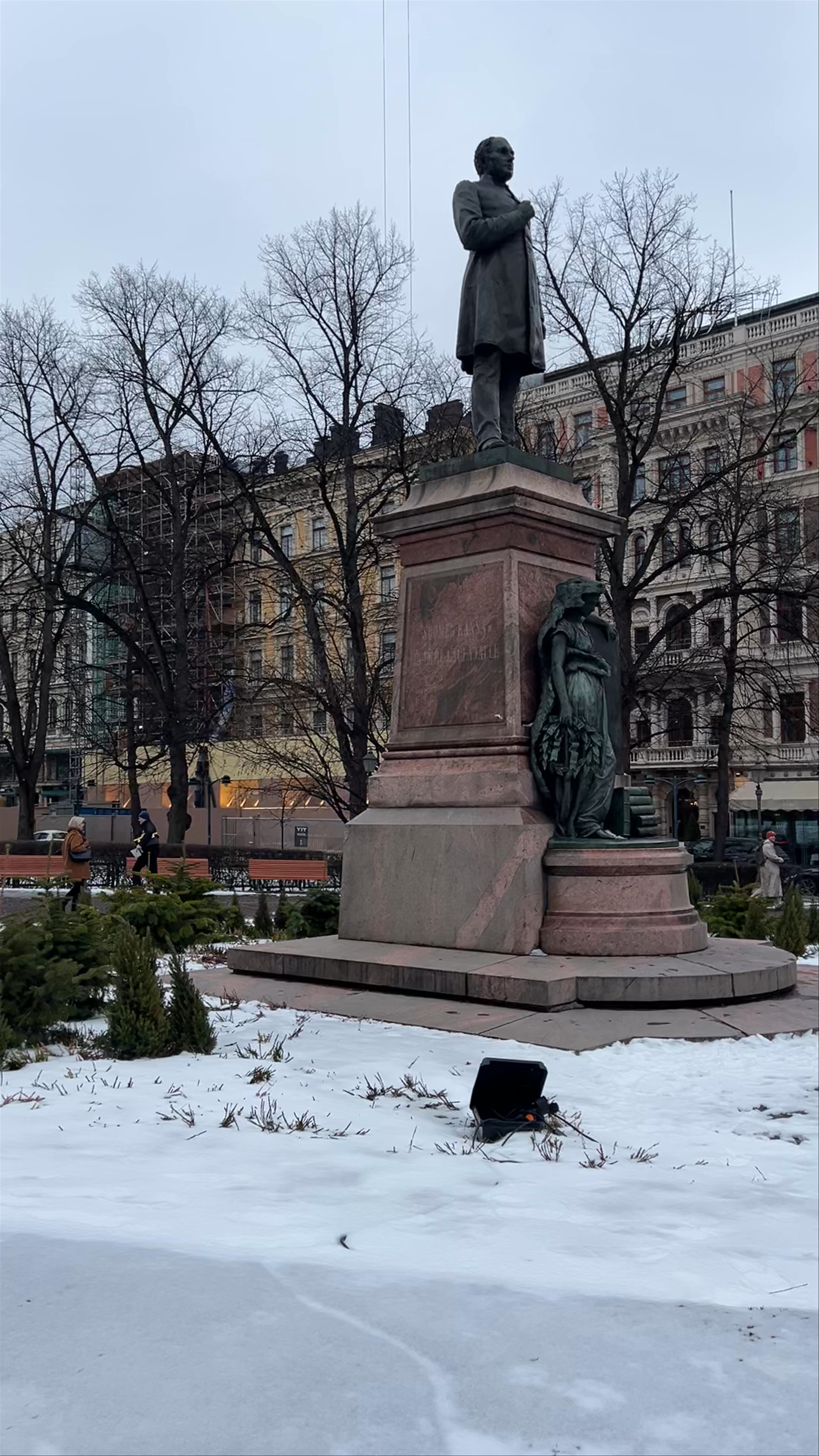 Johan Ludvig Runeberg Statue in Helsinki's Winter Cityscape