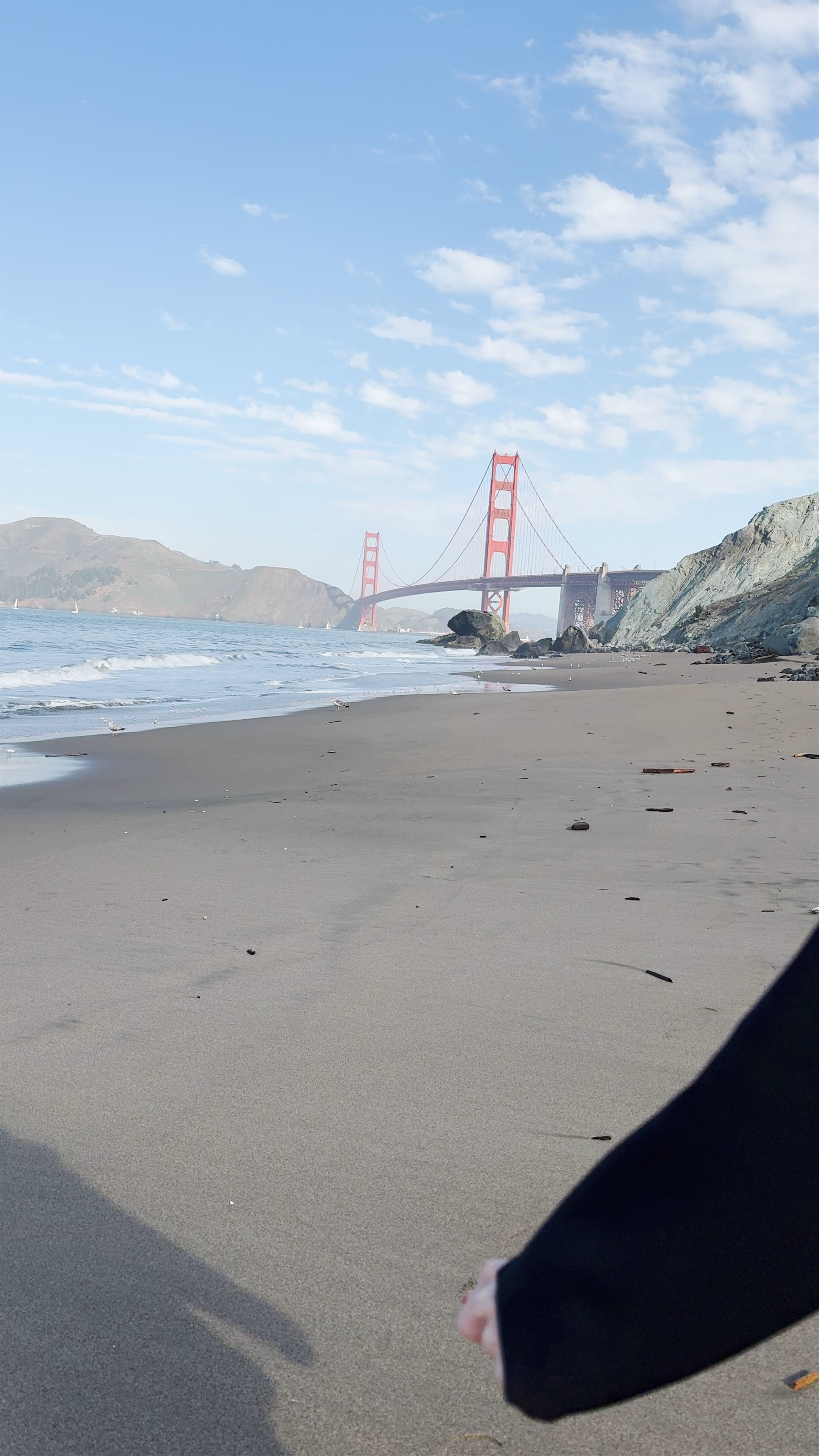Romantic Beach Stroll with Golden Gate Bridge Views at Marshall's Beach, San Francisco