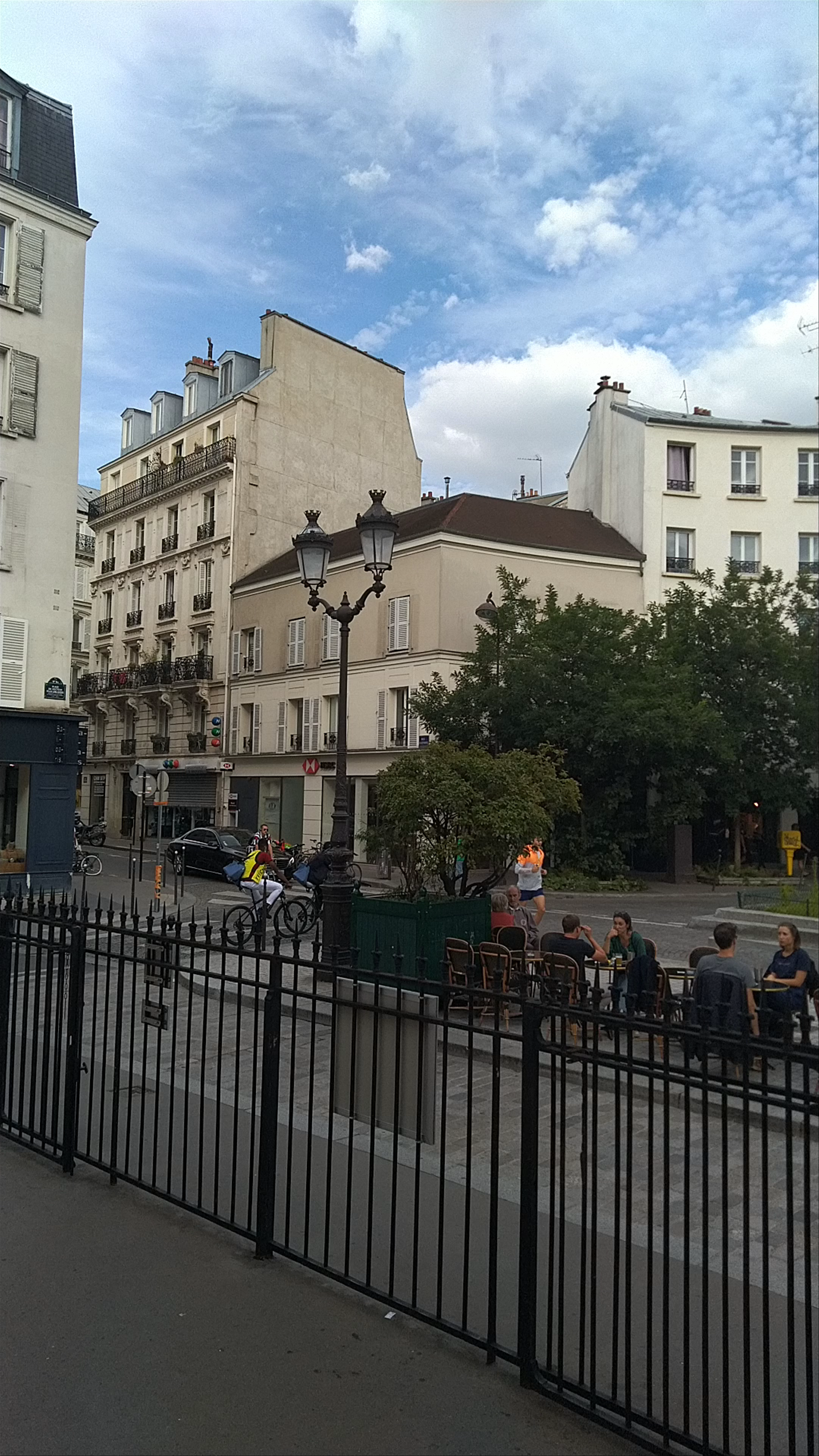 Charming Parisian Street Café Scene at Place du Docteur-Félix-Lobligeois