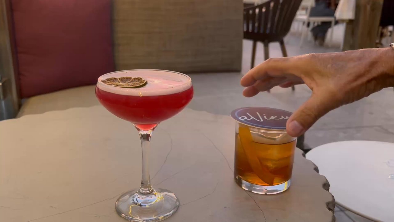 aView - You can see the Smoke of the Old Fashion with Cinnamon when he lifts the cover - Cocktail Bars Near Me - Wilmington, North Carolina