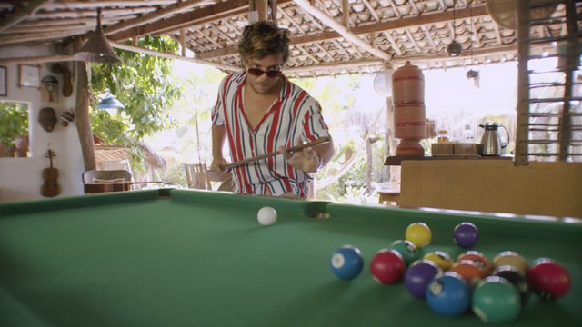 A man playing pool