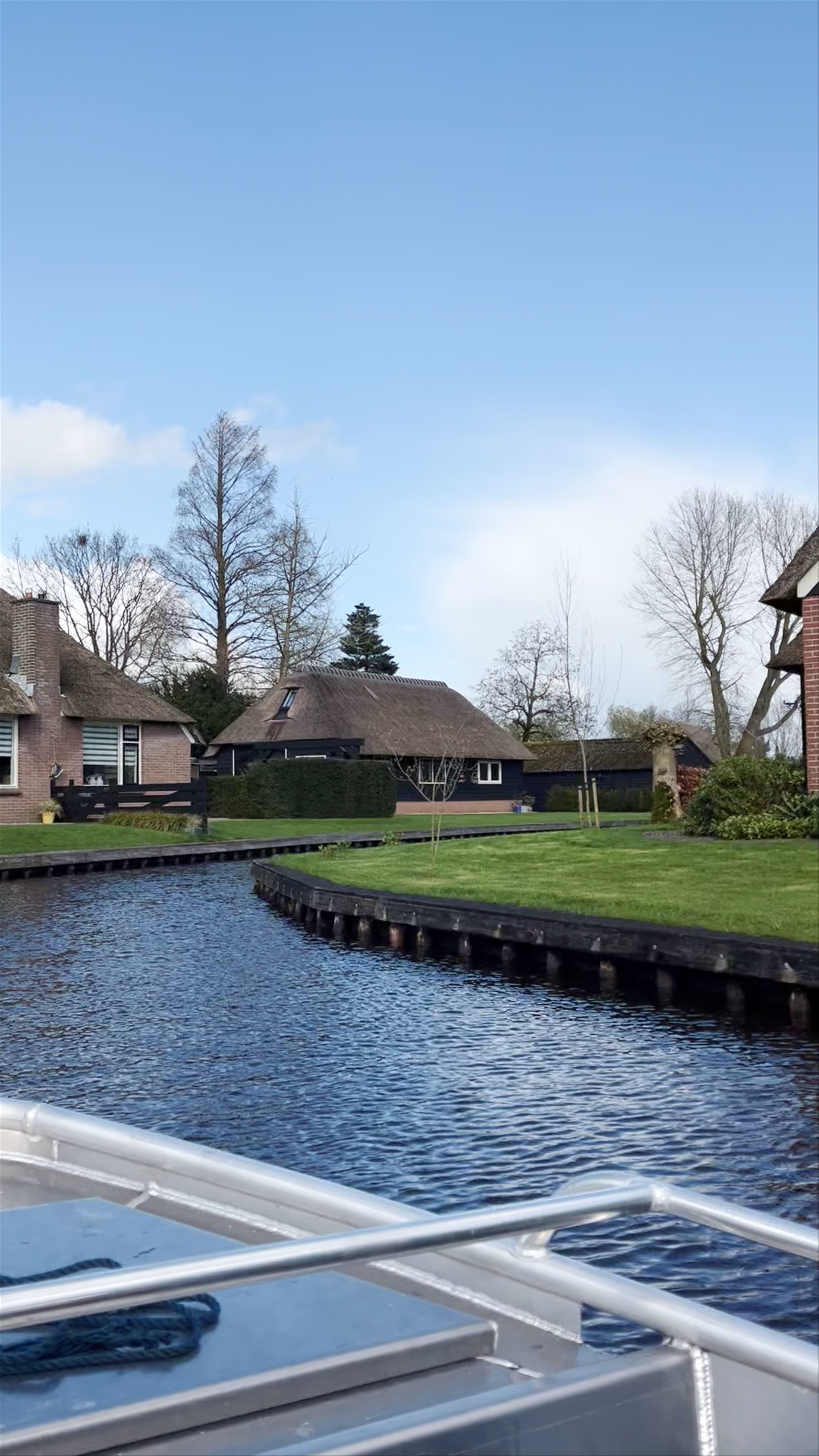 Serene Boat Ride Through Charming Canals in Giethoorn, Netherlands