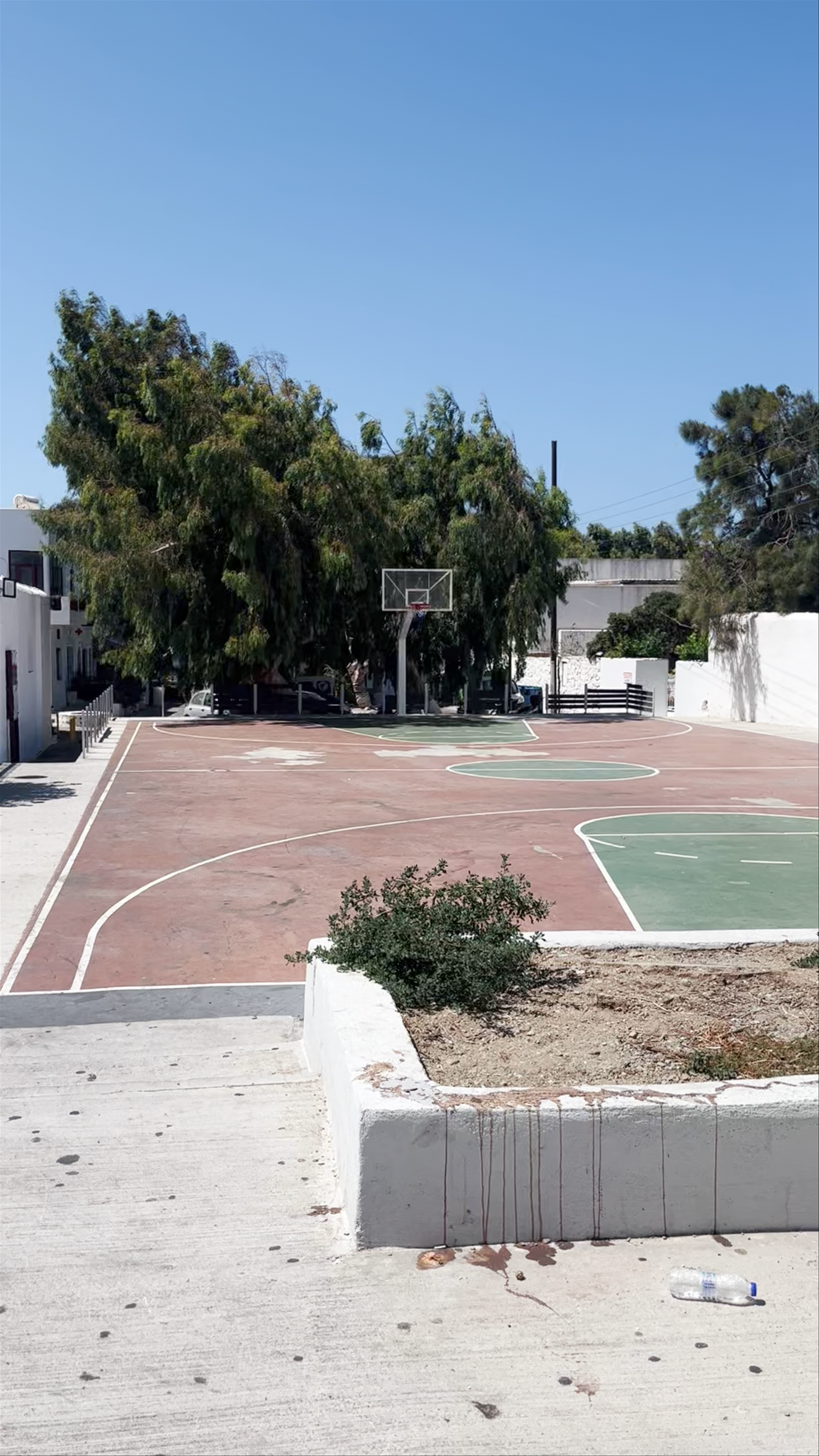 Sunny Outdoor Basketball Court in Mikonos Village