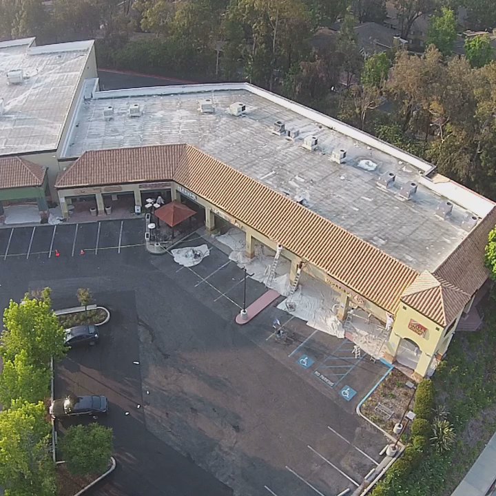 Precision Construction & Painting - We are painting the entire exterior of the Fresh and easy shopping center in oak park. Drone view - Painters Near Me - Thousand Oaks, California