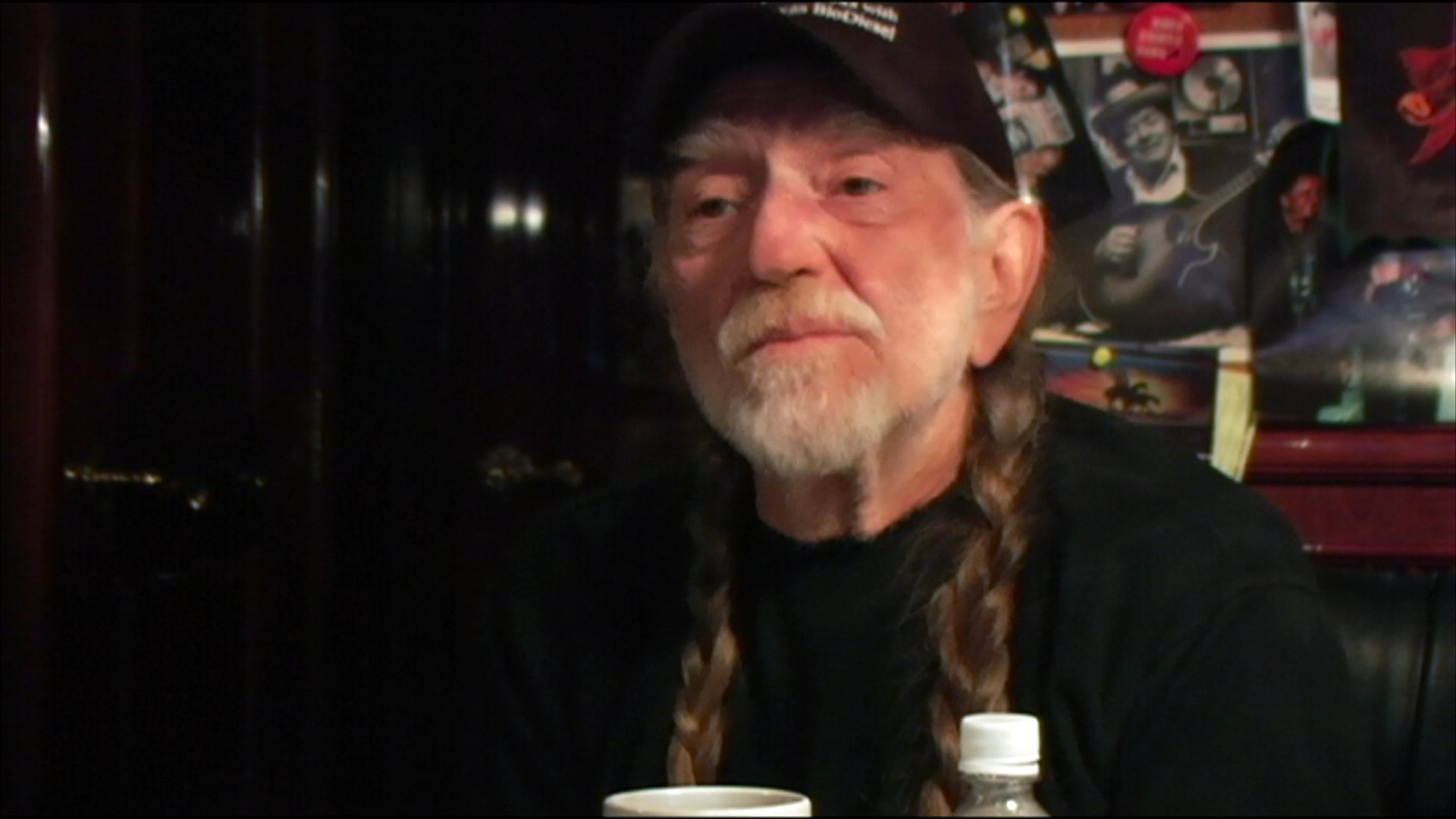 Willie Nelson and members of the Fryed Brothers band share insights during a documentary interview about their history within the motorcycle community.