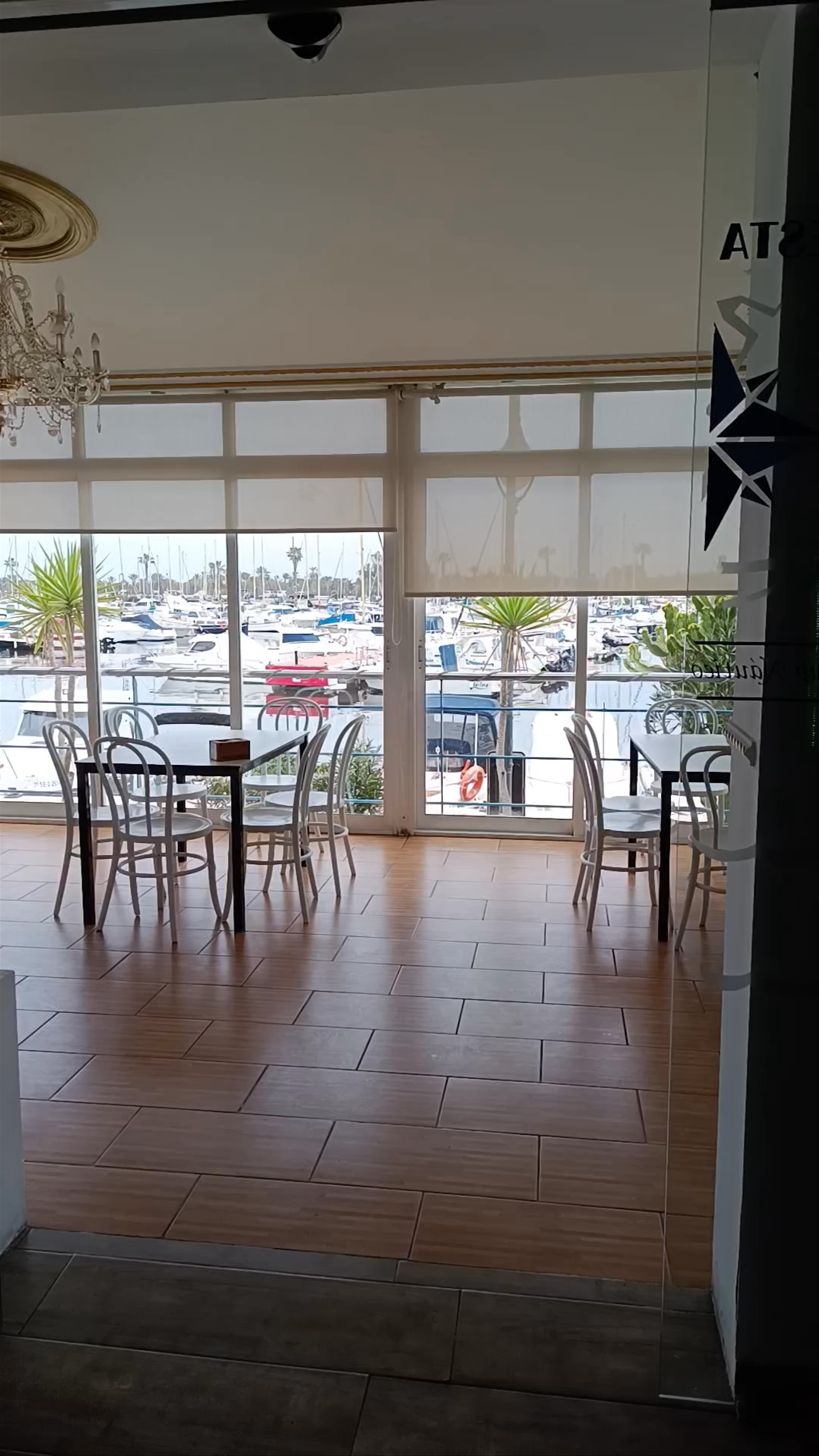 Serene Waterfront Dining at Club Náutico Guardamar, Spain