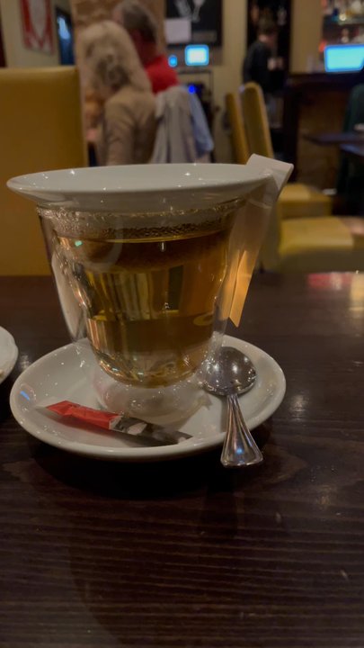ÖEINS - A simple and cozy moment with a warm chamomile tea at ÖEINS. Perfect for relaxation! - Austrian Near Me - Munich, BY