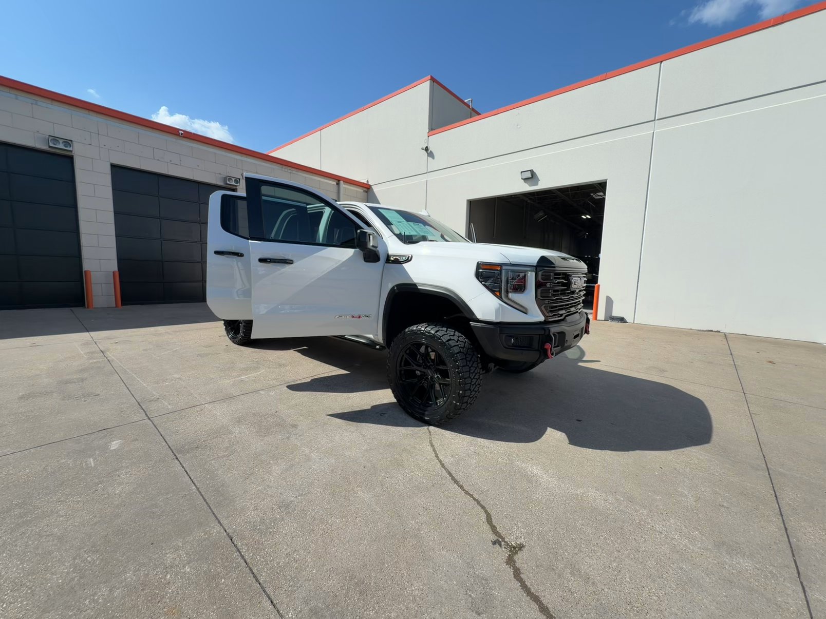 Lifted Trucks - #TX10486 - 2024 GMC Sierra 1500 AT4X Crew Cab