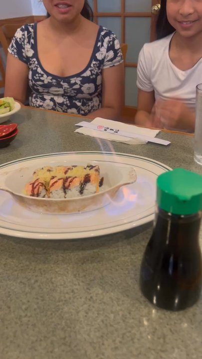 Haru Ichiban - Her plate came out flaming, she didn't even realize what she ordered lol. She just knew she wanted some crunchy Panko on top of her salmon. - Japanese Near Me - Duluth, Georgia
