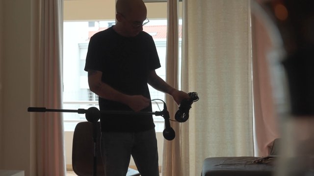 A man untangling a cable