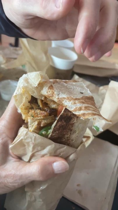 The Duo | Doner Kebab - The lavash bread is thin and delicate. Leave the sandwich wrapped while you eat, rolling down the paper as you go. - Sandwiches Near Me - Siesta Key, Florida