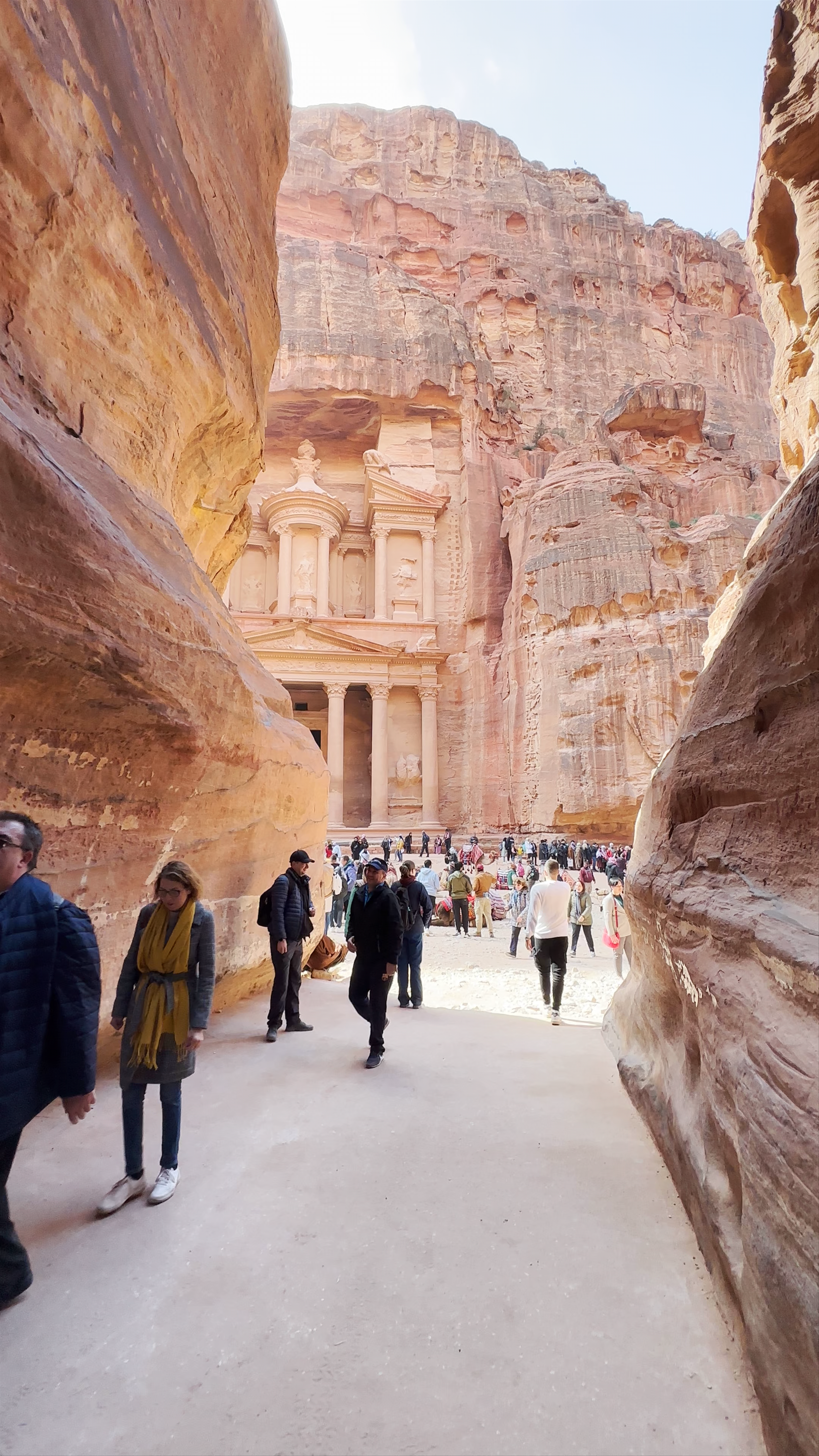 Petra, Jordan: Entrance to the Treasury Amidst Majestic Red Cliffs