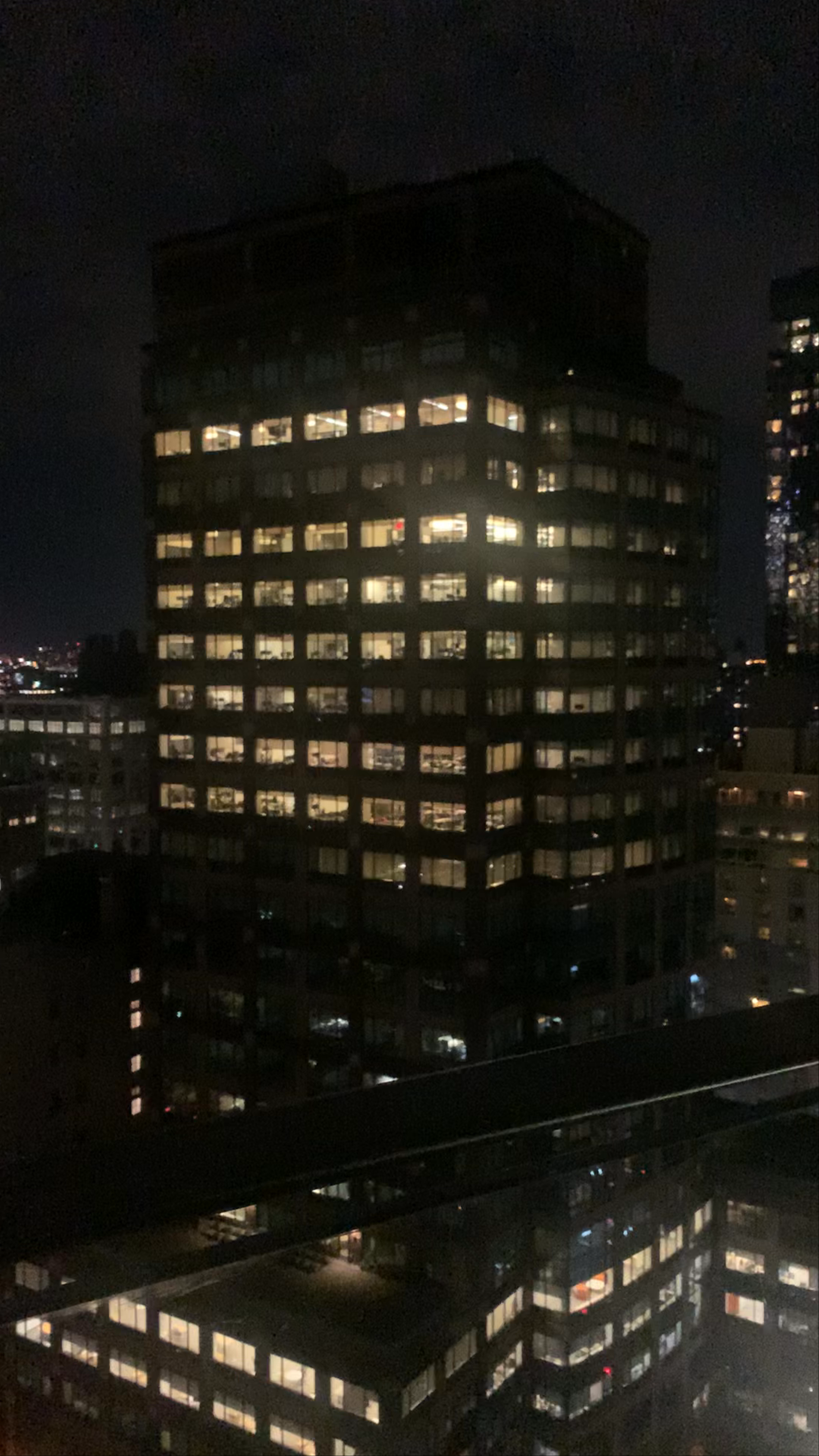 Nighttime Rooftop Gathering on Thompson Street, New York