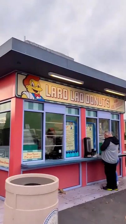 Lard Lad Donuts - Getting the Big Pink donut ($10.99) at Lard Lad Donuts at Universal Studios Florida. Yum! - Donuts Near Me - Orlando, Florida