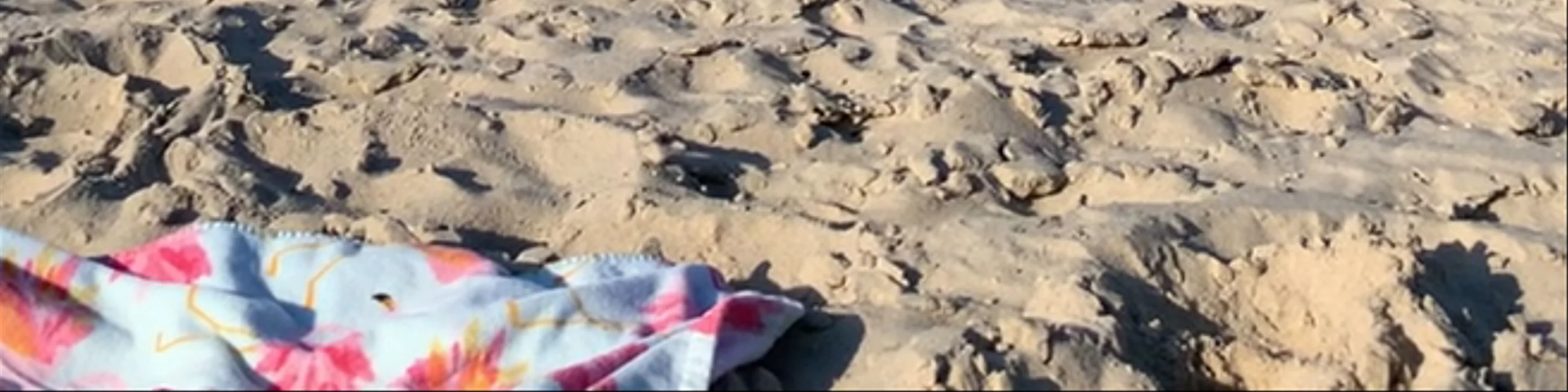 Sore Thumb Drive On Beach