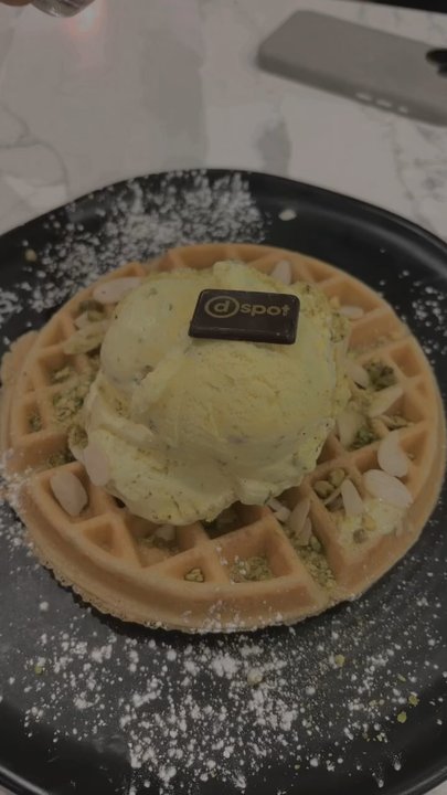 D Spot - Hot waffles with saffron pistachio ice cream and white chocolate swirls. - Desserts Near Me - Markham, Ontario
