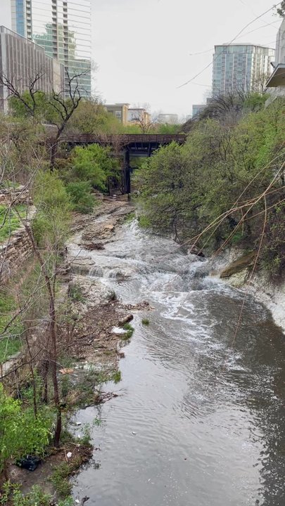 Butterfly Bridge - Rushing water on Shoal Creek after a morning shower - Local Flavor Near Me - Austin, Texas