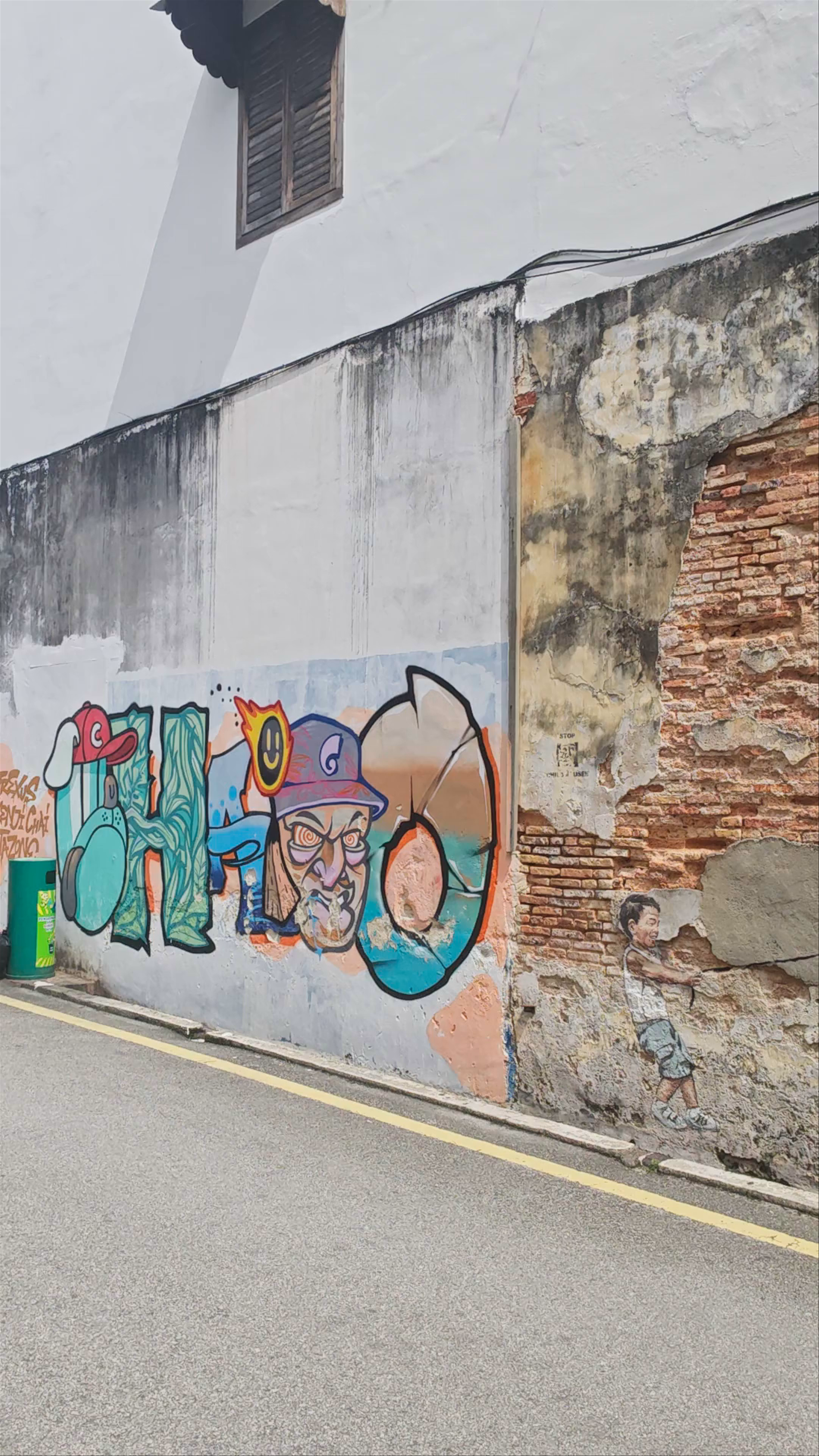 Street Art - Boy on Motorbike by Ernest Zacharevic