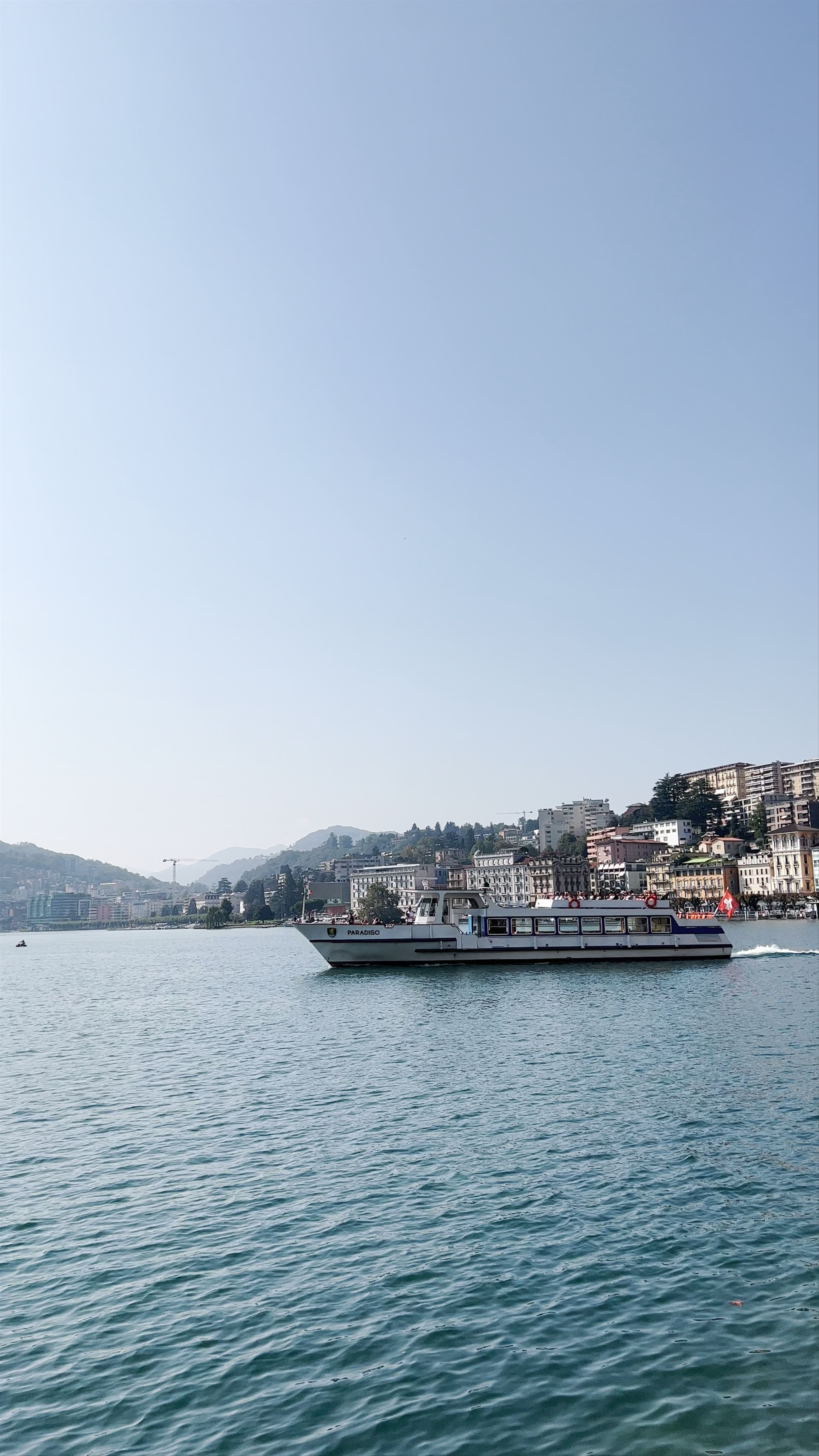 Scenic Boat Cruise on Lake Lugano with Stunning City and Mountain Views