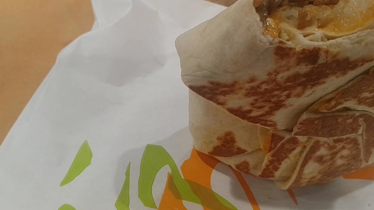 Taco Bell - just a little description of what a breakfast crunchwrap is versus the standard you can opt for steak sausage or just egg and cheese - Mexican Near Me - Kearney, Missouri