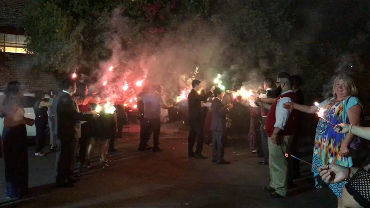 The Mitten Building - A sparkler send-off for newlyweds Conner and Caroline Carlson! - Venues & Event Spaces Near Me - Redlands, California