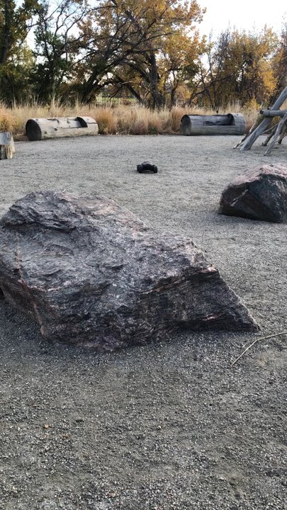 Parker Jordan Centennial Open Space - Small gravel area with log and boulders for seating - Hiking Near Me - Centennial, Colorado