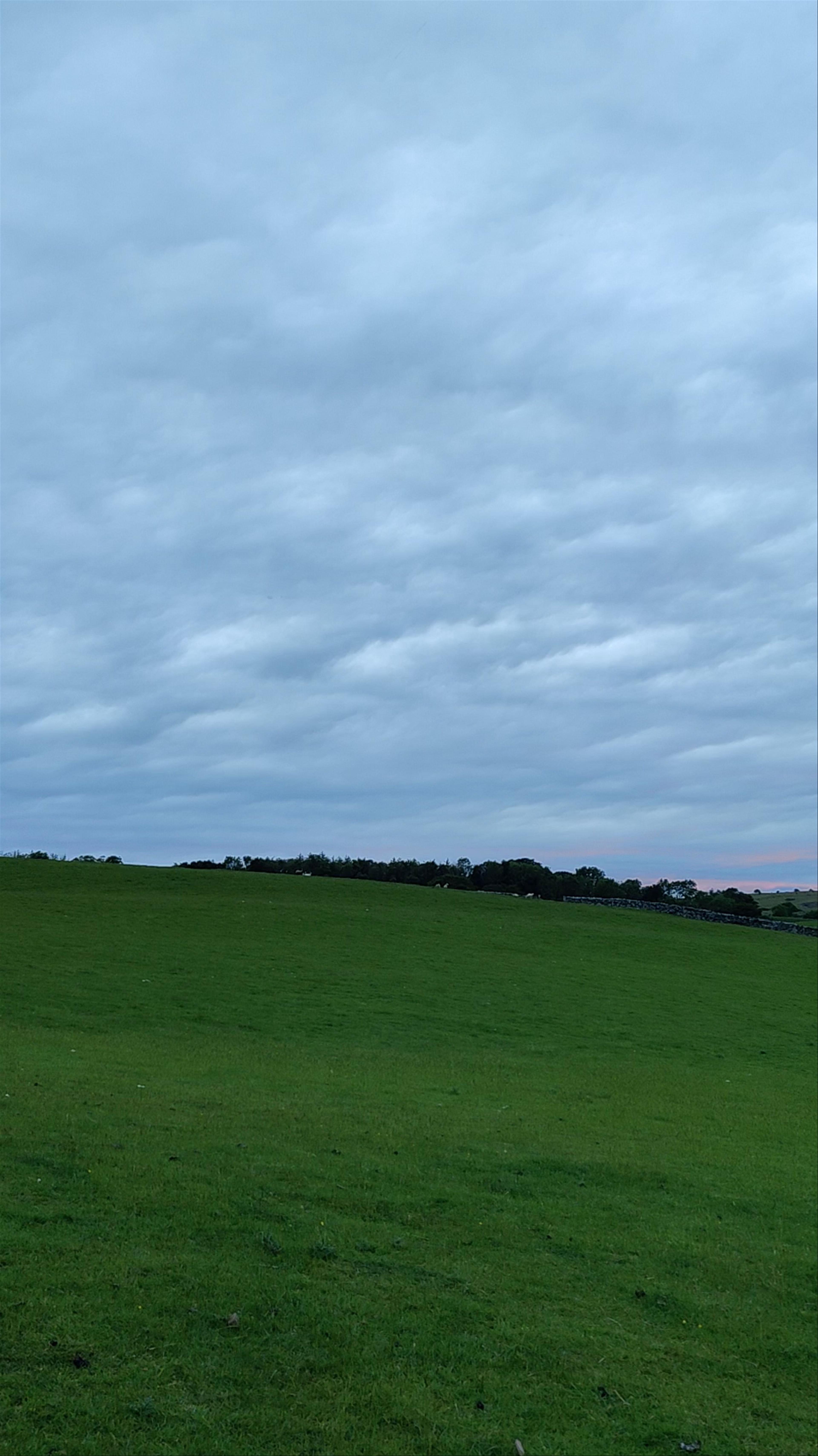 Sunset Over Rolling Green Hills in Kendal, England