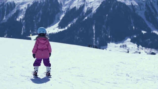 Two girls skiing 