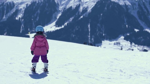 Two girls skiing