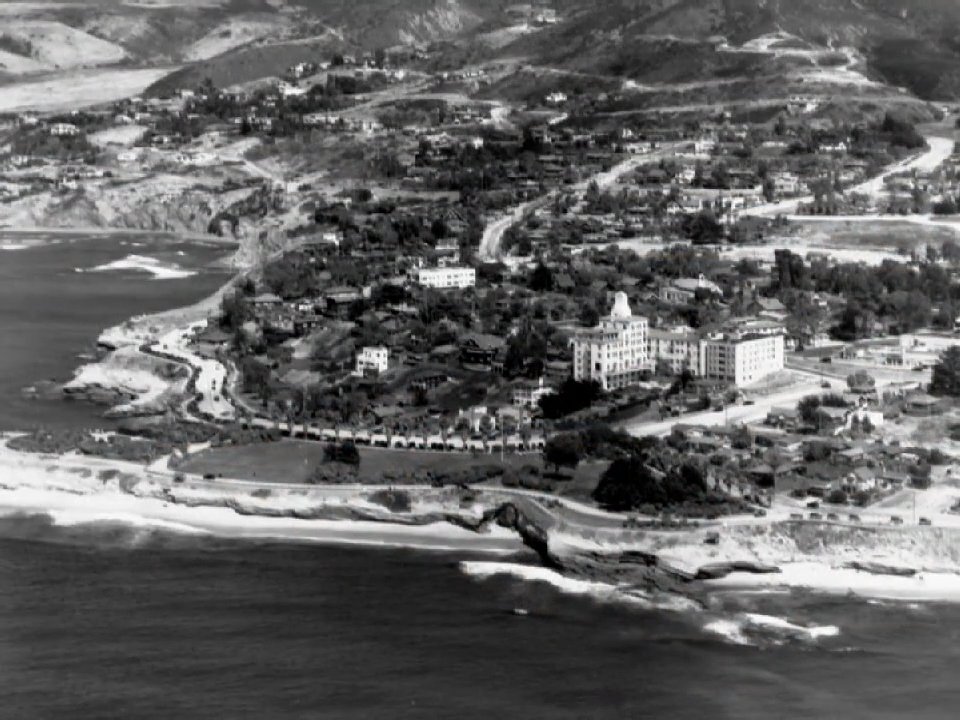 Archival footage showcases historical coastal town landscapes and intimate family portraits, highlighting an era of early aviation and seaside development.