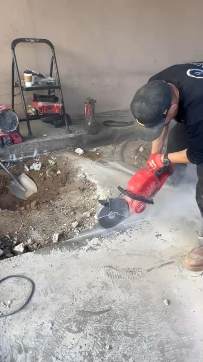 Clearwater Plumbing - Our guys working hard cutting 5x5 concrete in order to get to problem area - Plumbing Near Me - Gardena, California