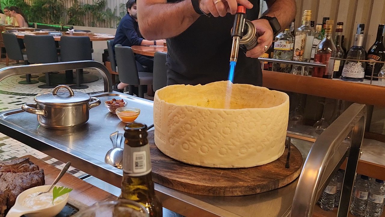 Capa na Baixa - Using a blowtorch to melt the cheese. - Steakhouses Near Me - Porto, 13