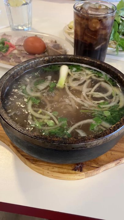 Pho Viet - Boiling bowl of pho - Vietnamese Near Me - West Des Moines, Iowa