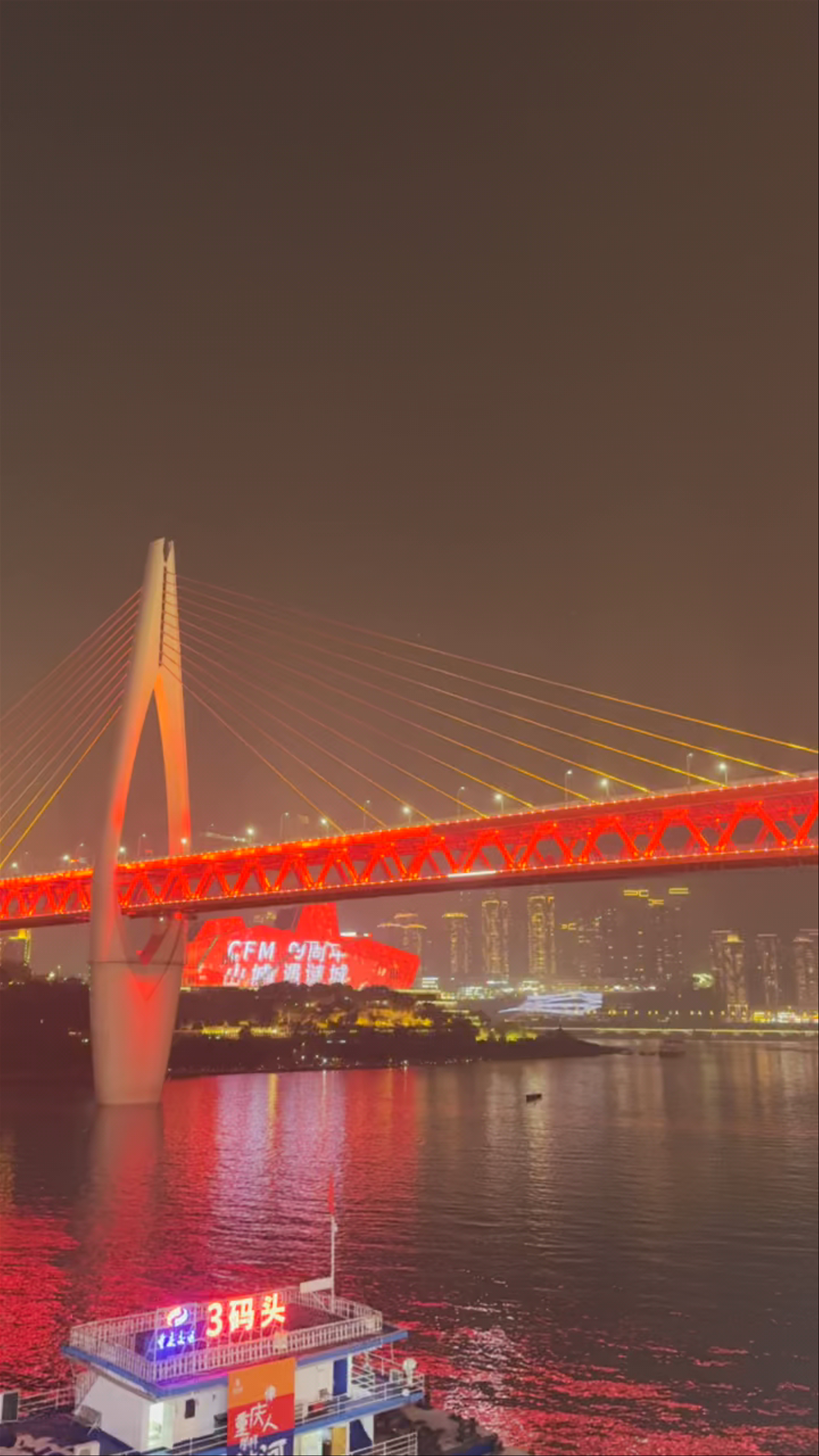Chongqing Hongyadong: Night View of the Iconic Red Bridge and Riverside Skyline