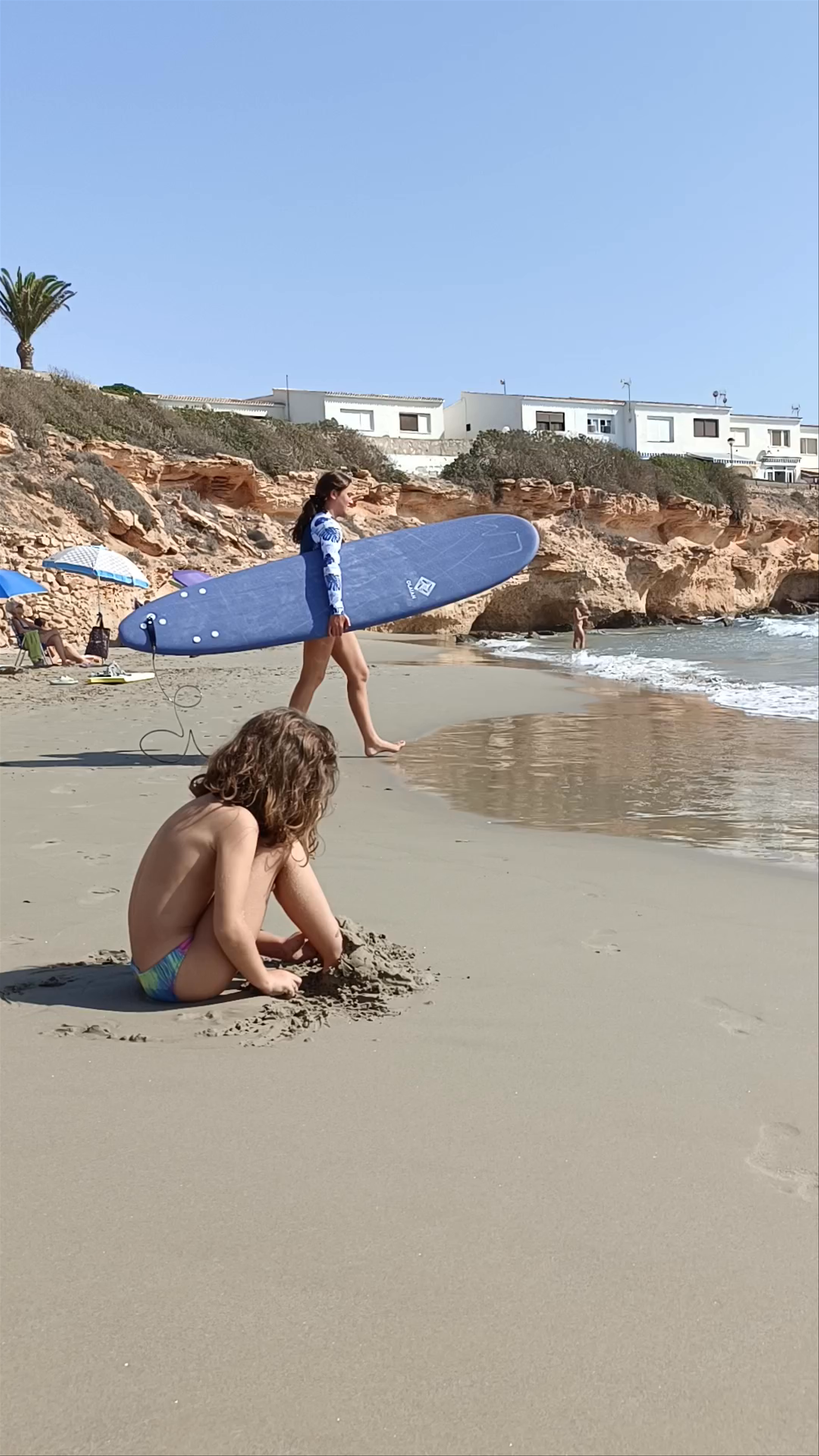 Sunny Surf and Sand at Playa Cala Cerrada, Orihuela