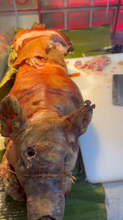 Zubuchon - staff chopping lechon - Filipino Near Me - Lapu-Lapu City, CEB