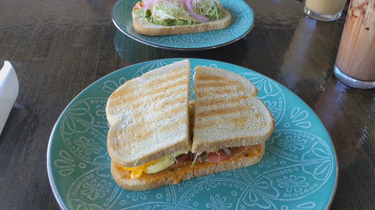 Carmel Cafe - This is the Pesto Avocado Toast and the Breakfast Sandwich. - Coffee & Tea Near Me - Brea, California