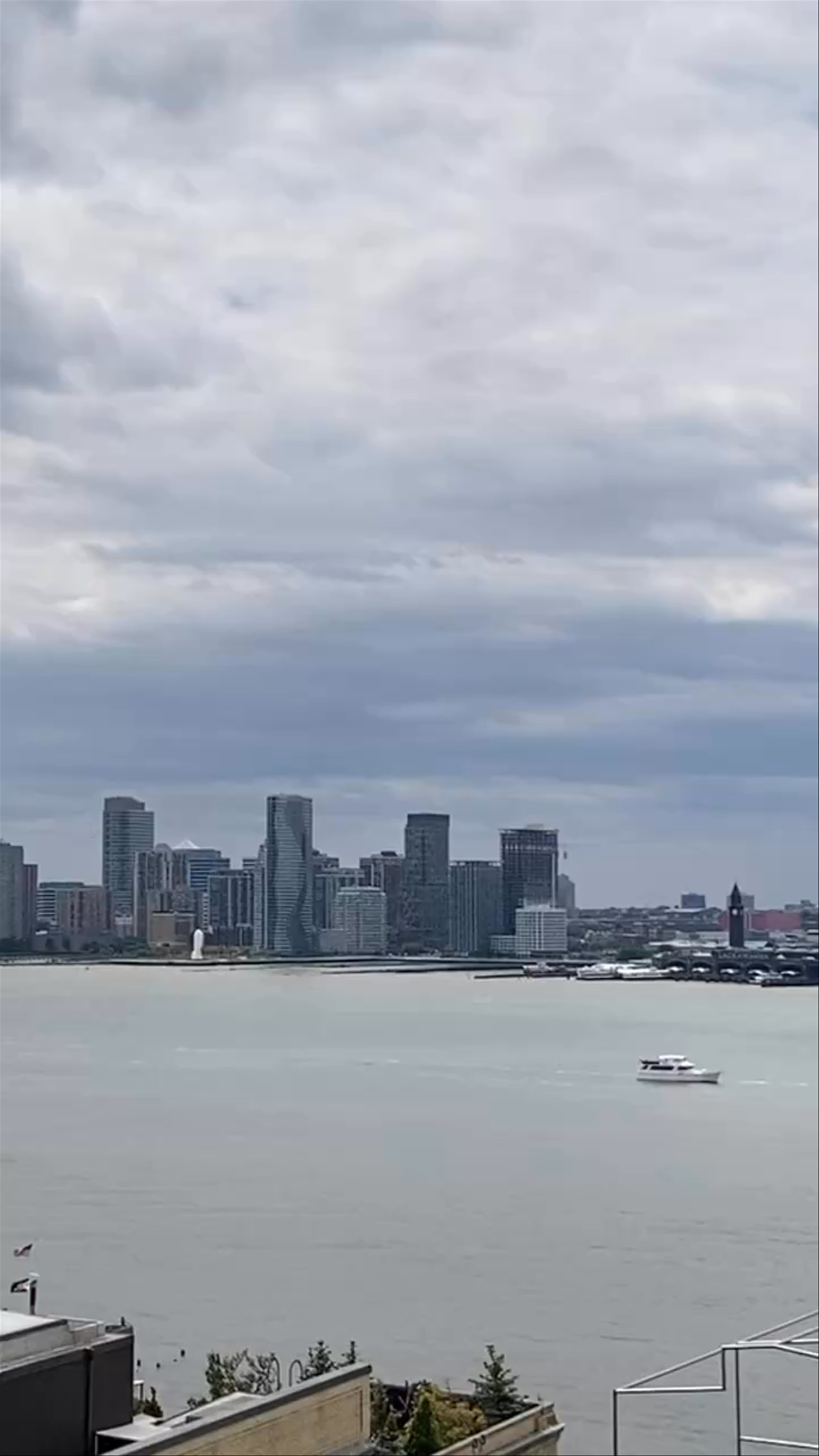Vista Point Panorama: Moody Skies Over New York City Skyline