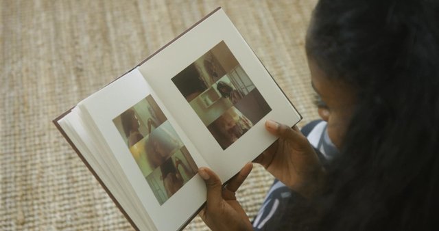 Woman looking at a picture book
