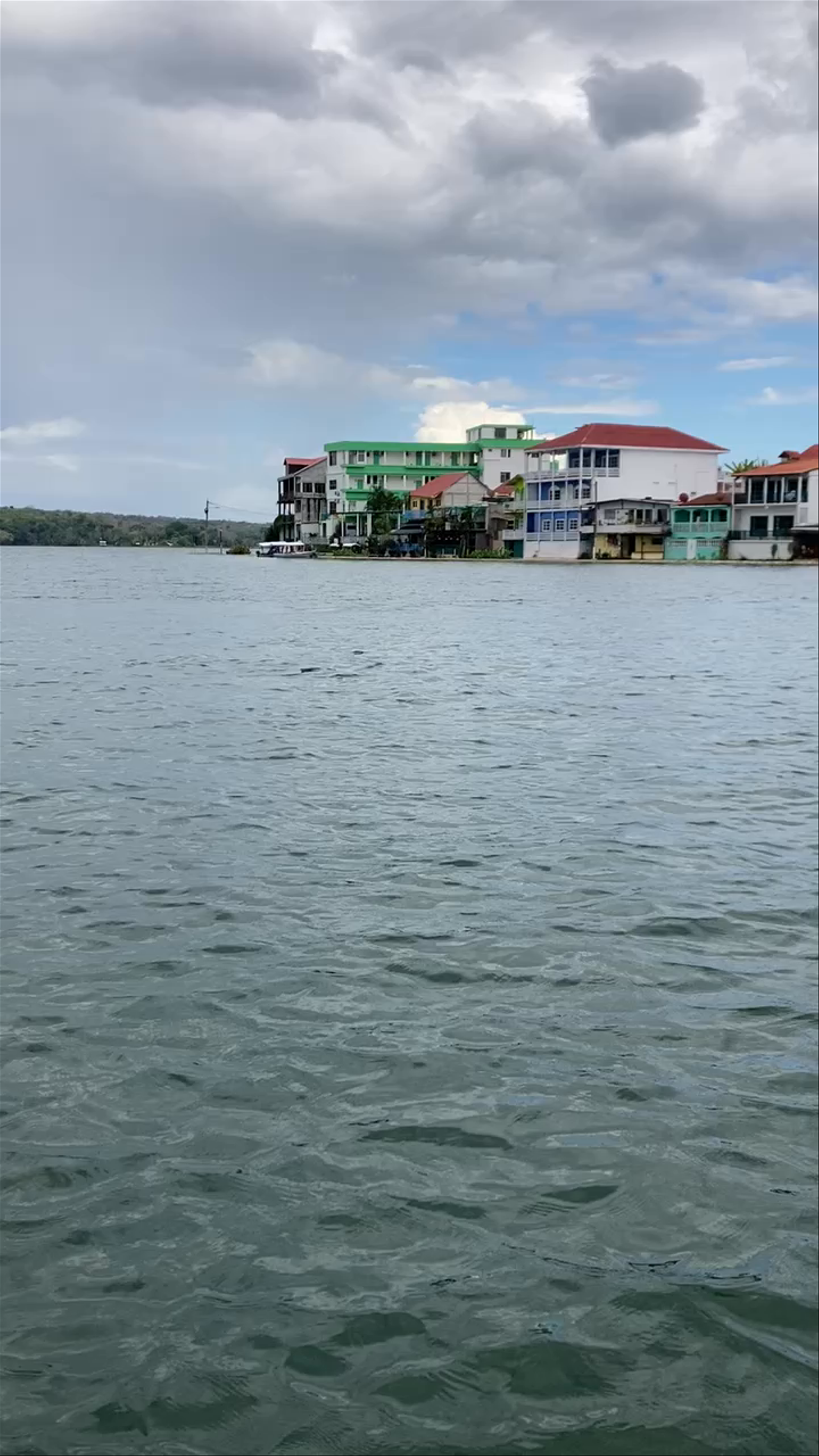 Scenic Boat Ride Along the Waterfront in Flores, Guatemala