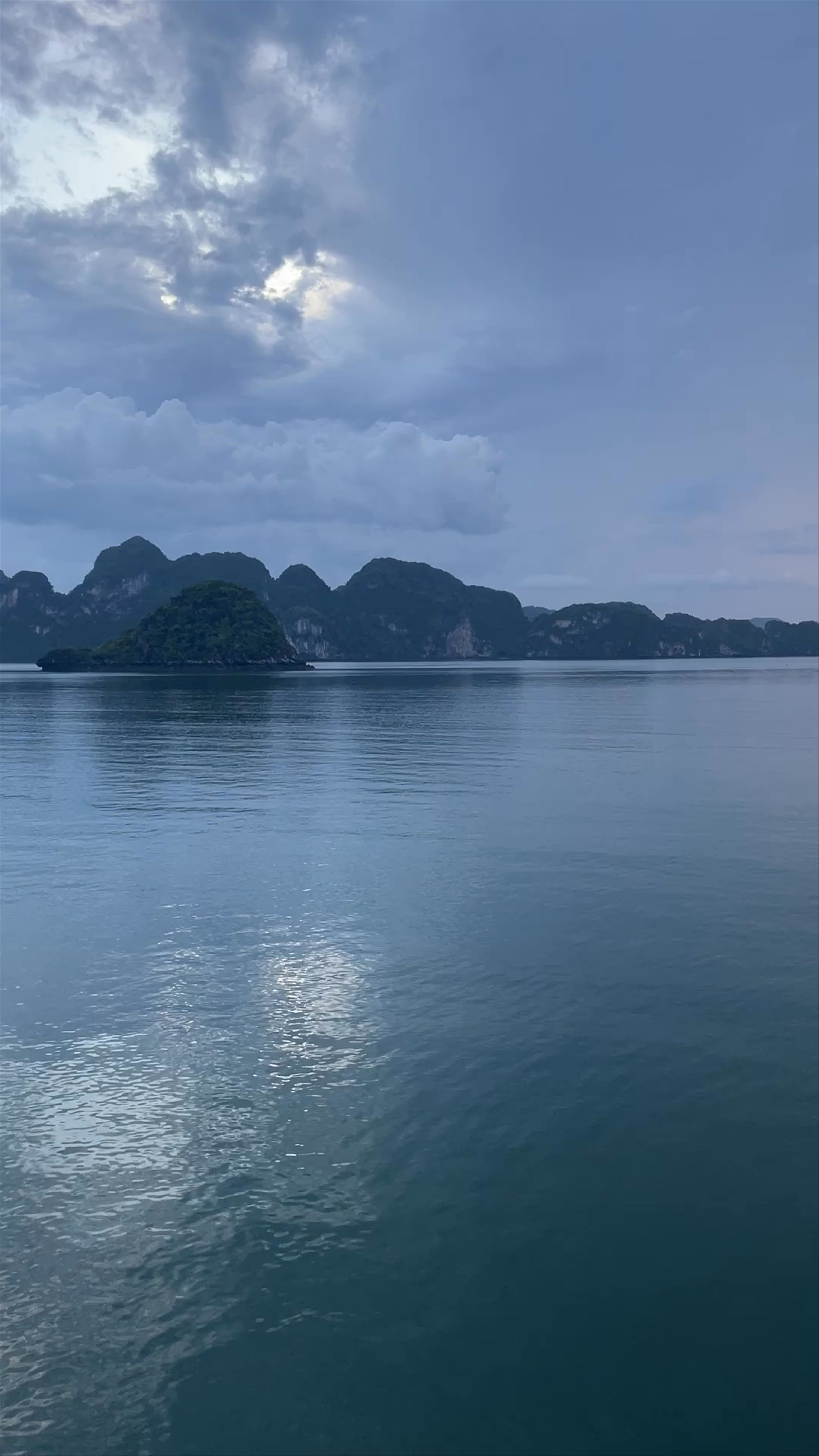Halong Bay Serenity: Twilight Over Vietnam's Majestic Seascape