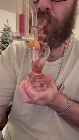 Preview pic of Trill Glass fumed recycler dab rig featuring a faceted Klein design.