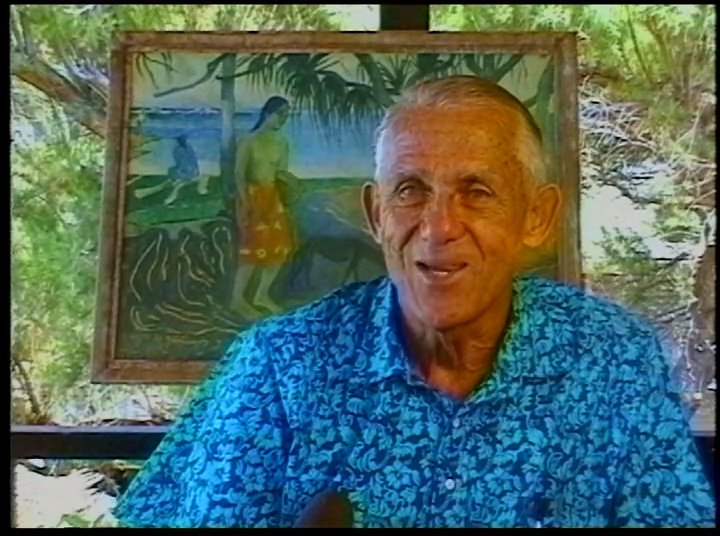 An experienced surfer discusses his connection to the ocean while juxtaposed with archival footage of massive surf breaks. The narrative shifts between personal reflection and the technical challenge of riding large waves.
