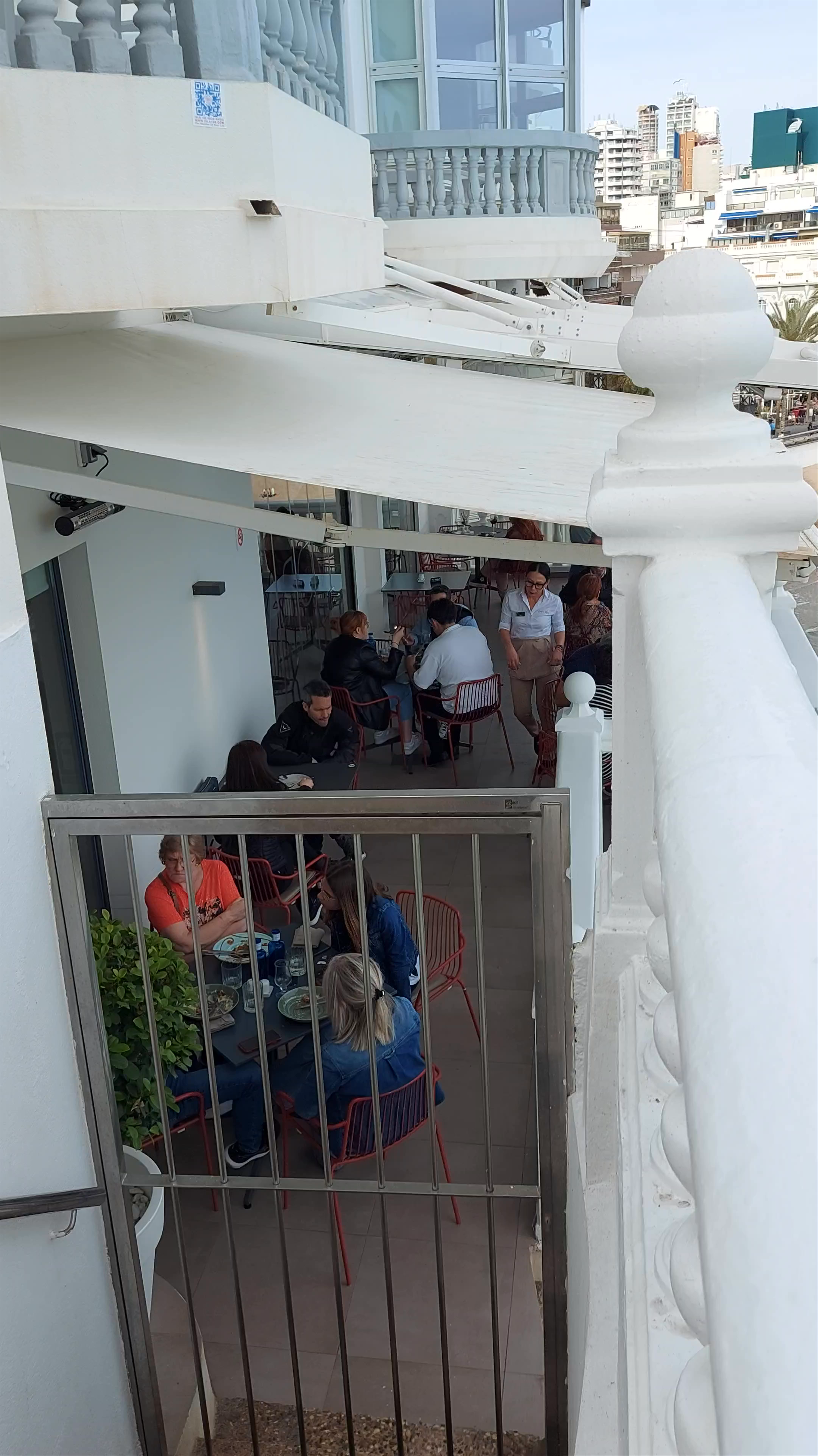 Seaside Dining and Cityscape Views in Benidorm, Spain
